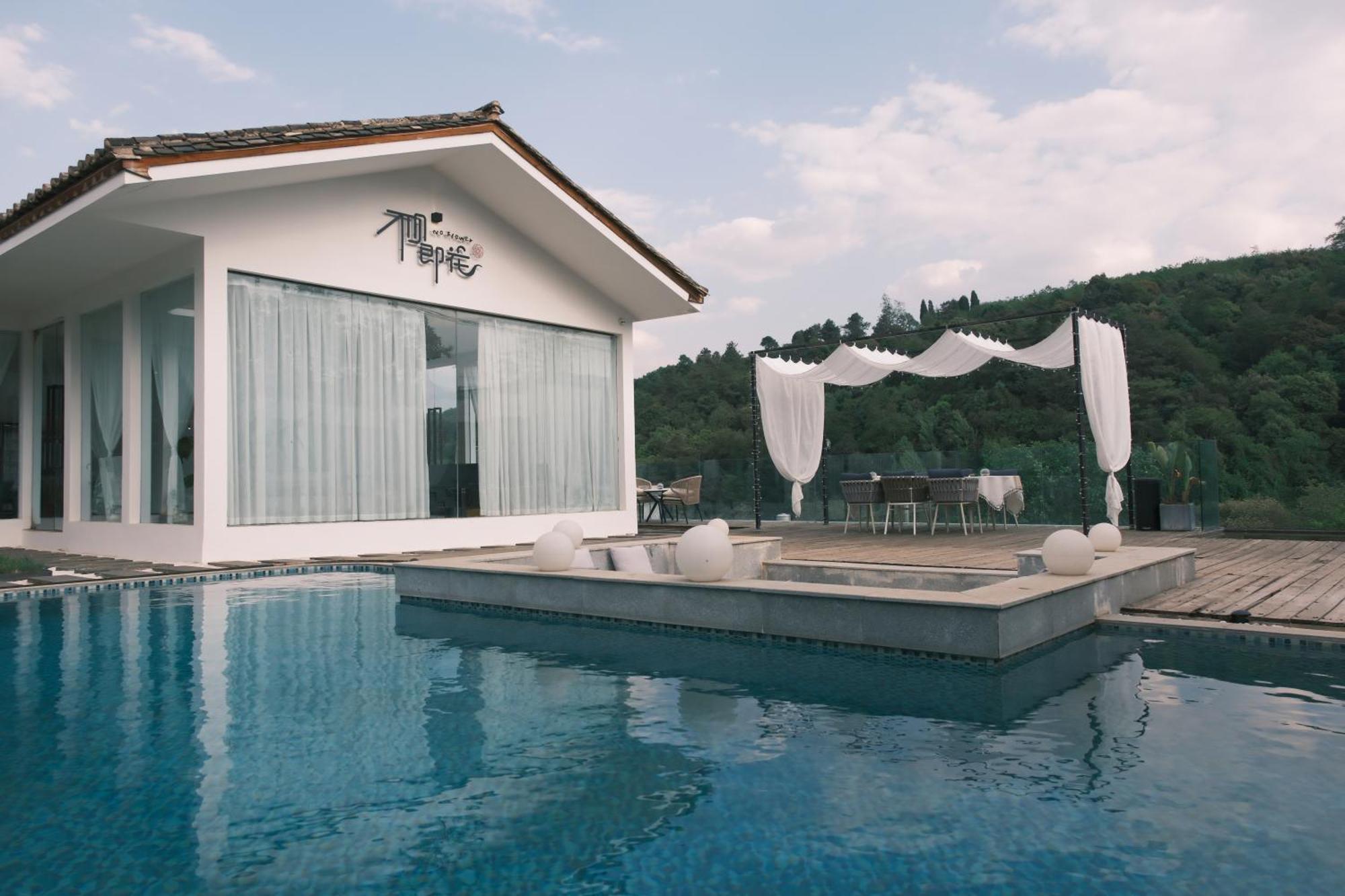 No Flowers Boutique Hostel Кунмин Екстериор снимка