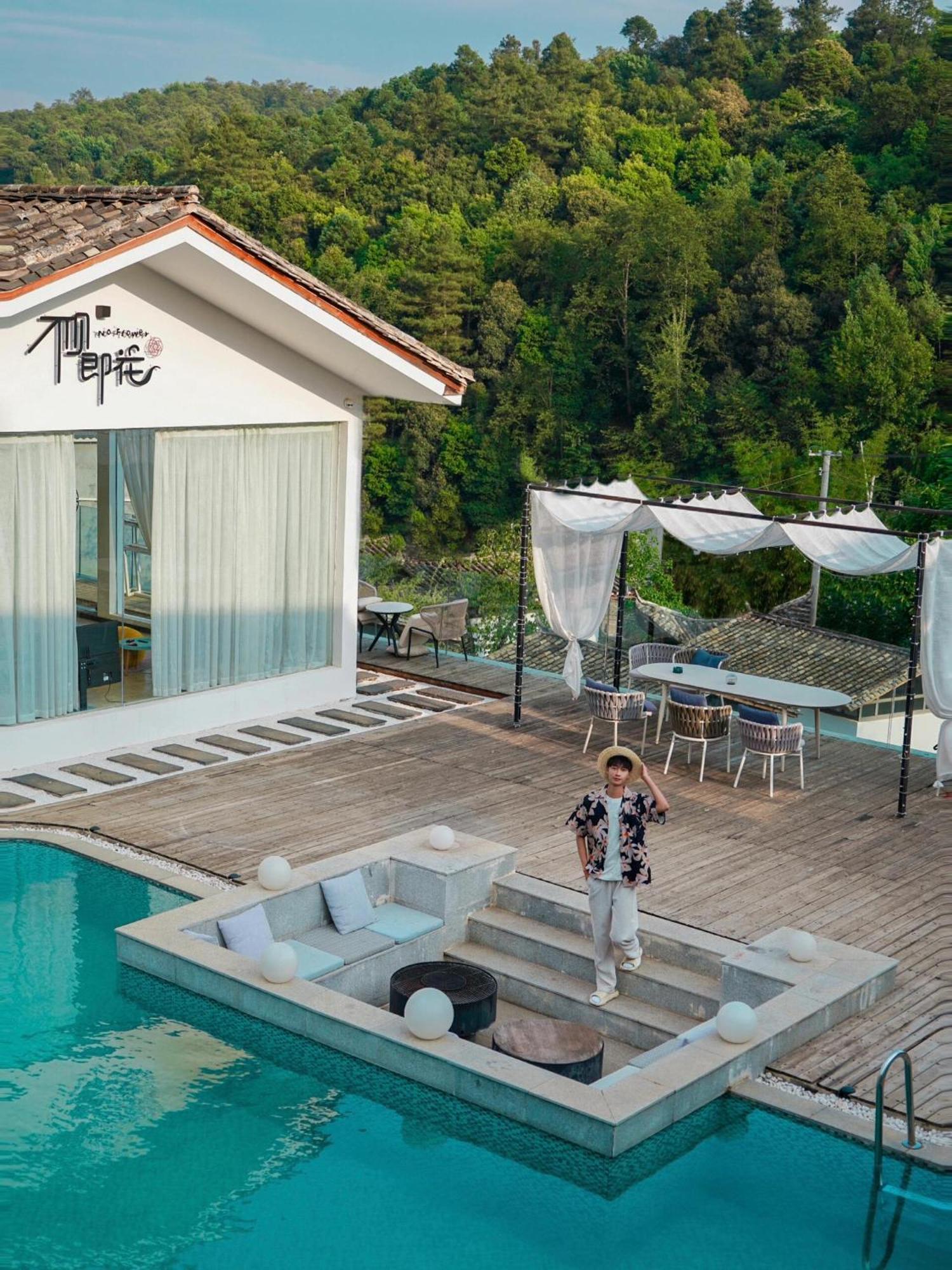 No Flowers Boutique Hostel Кунмин Екстериор снимка